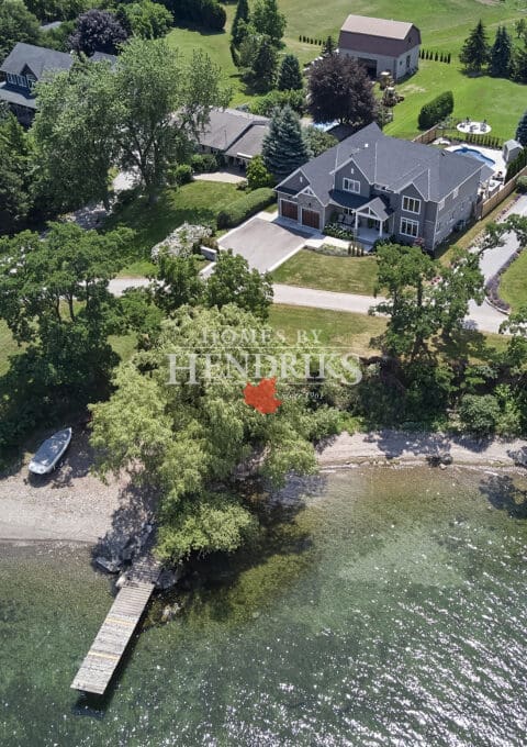 A Drone Shot of the Property Over the Lake