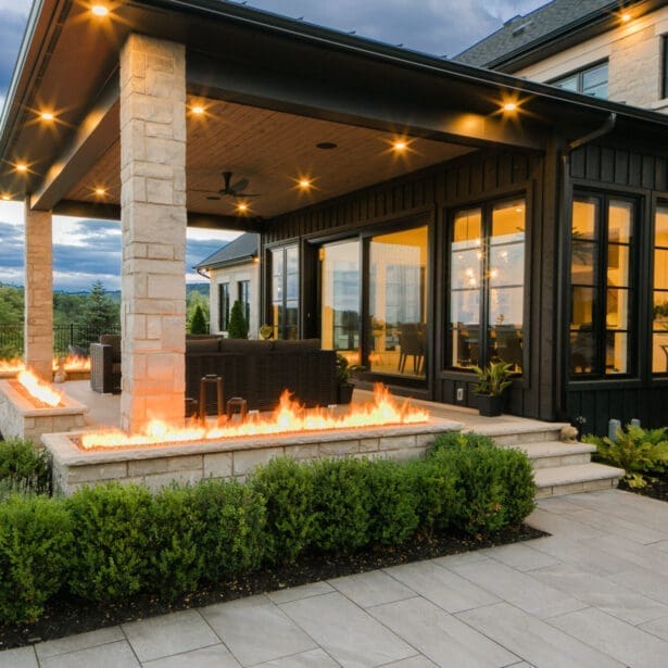 An inviting rear view of a backyard, blending stunning hardscaping with lush landscaping for a perfect outdoor space.