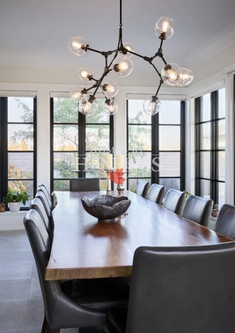 Close-up of the dining table surface and décor accents in the dining area.