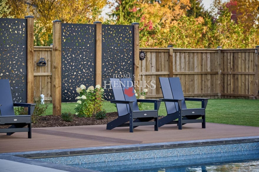 comfortable pool chair positioned by the sparkling pool, offering a perfect spot for relaxation.
