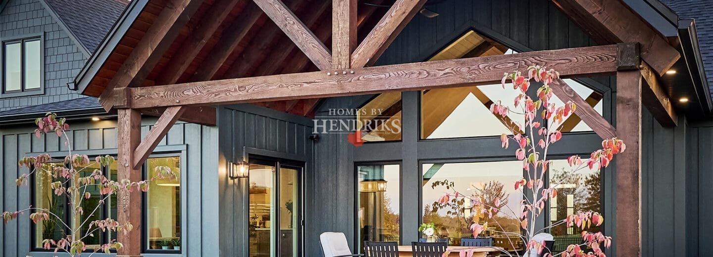 A beautifully designed rear patio featuring interlocking pavers that create a durable, stylish outdoor space.