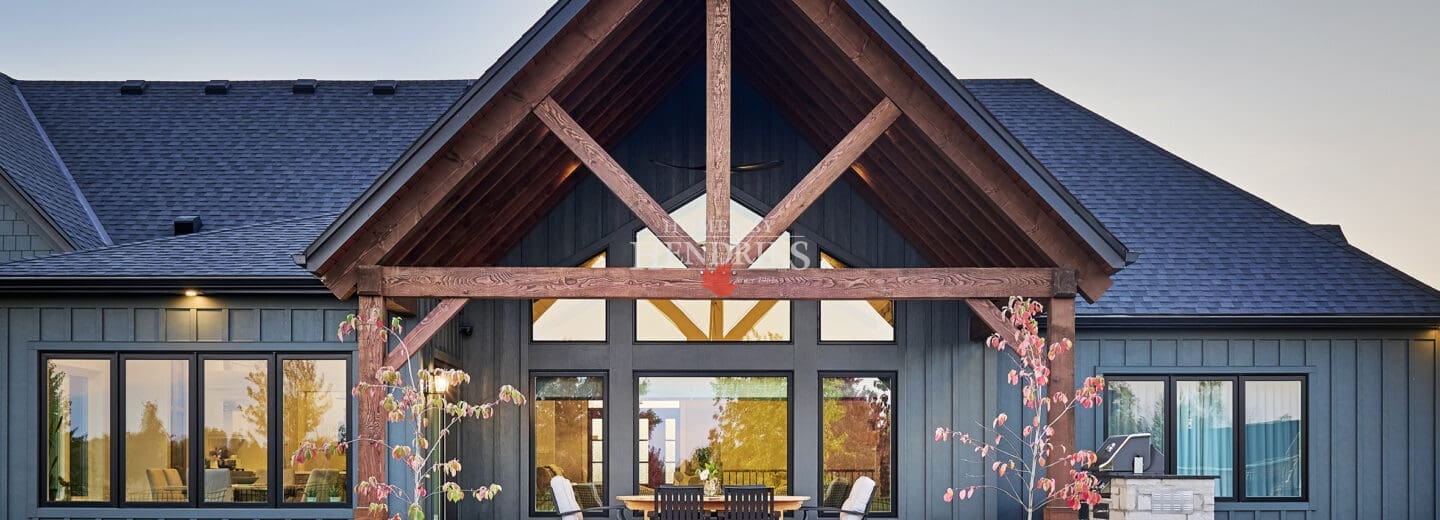 A charming timber-framed covered porch at the rear of the home, offering a perfect spot to relax and enjoy the outdoors.