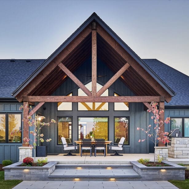 A charming timber-framed covered porch at the rear of the home, offering a perfect spot to relax and enjoy the outdoors.