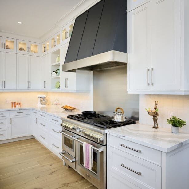 Modern chef’s kitchen with a large island, premium appliances, and custom cabinetry