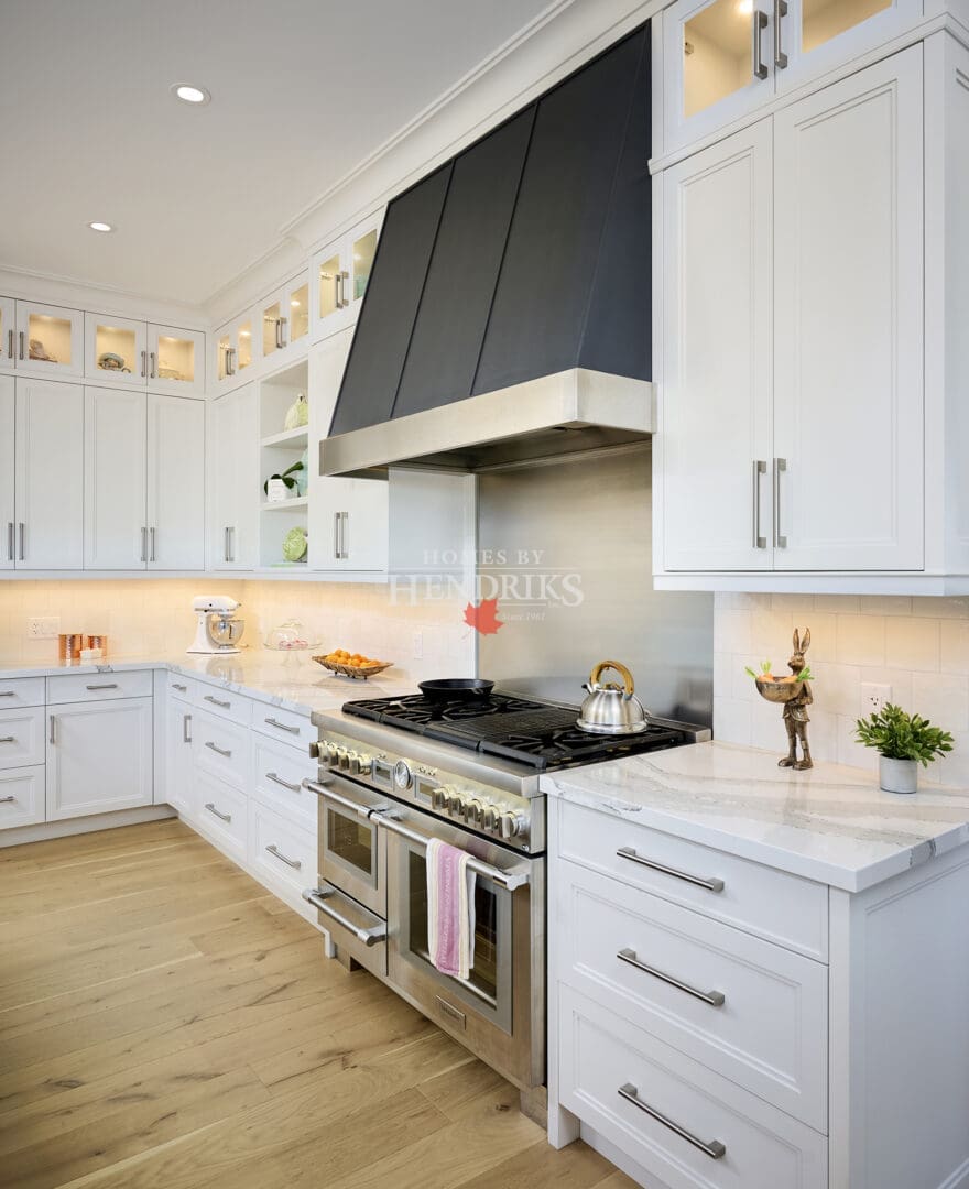 Modern chef’s kitchen with a large island, premium appliances, and custom cabinetry