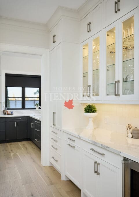 Walk-in pantry with built-in shelving and ample storage for kitchen essentials