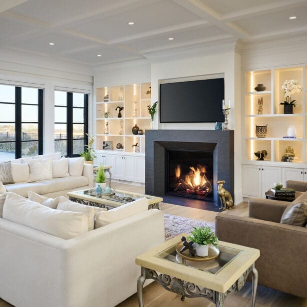 Contemporary solid-surface fireplace featuring a horizontal gas insert and clean, minimalist detailing.