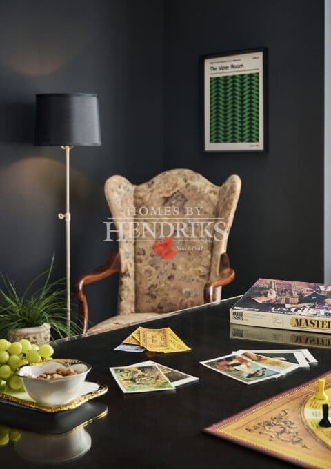 Detailed view of the dining room table and elegant finishes.