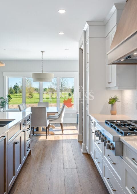 An open-concept kitchen seamlessly flowing into a dining area