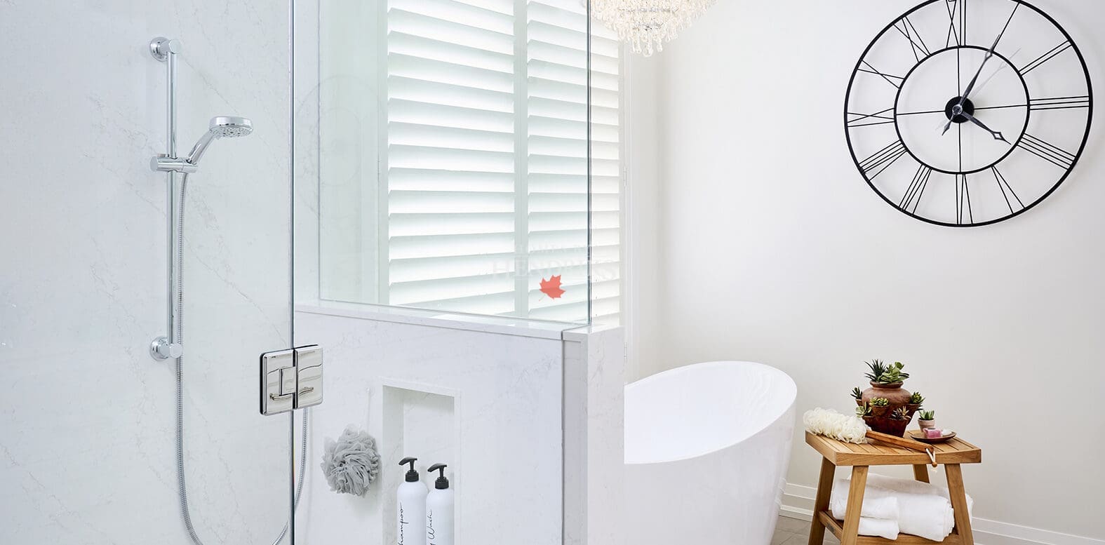 Clean, minimalist shower design with frameless glass enclosure, chrome hardware, and linear drain for a sleek contemporary finish.